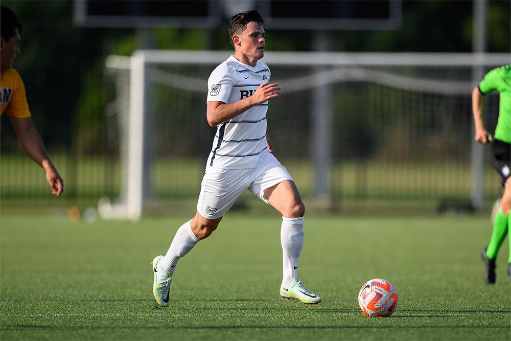 Joost de Schutter, voetballer voor Butler University, begeleid door Slamstox